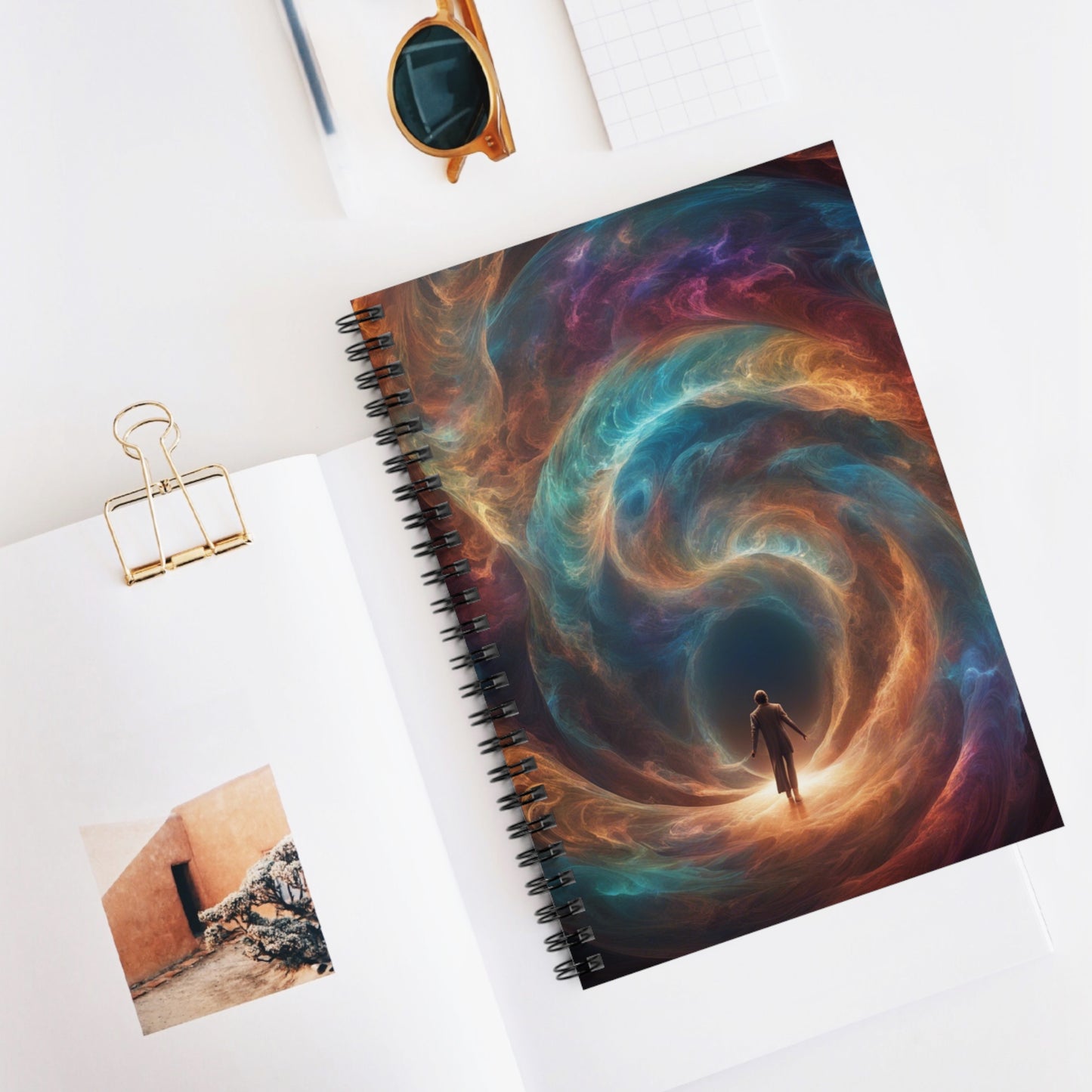 The Portal of Hope Notebook placed on a desk with other essentials, creating a stylish and inspiring workspace.