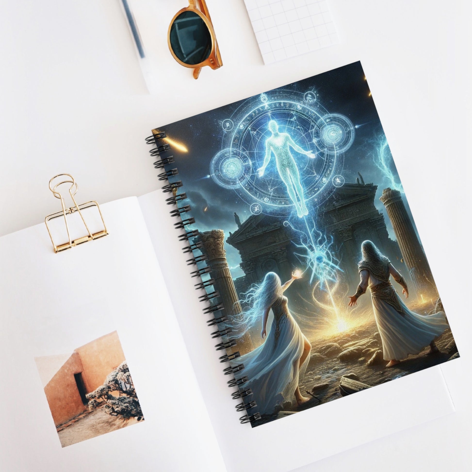 The Arrival Notebook placed on a desk alongside writing essentials, making it the perfect companion for daily journaling and note-taking.